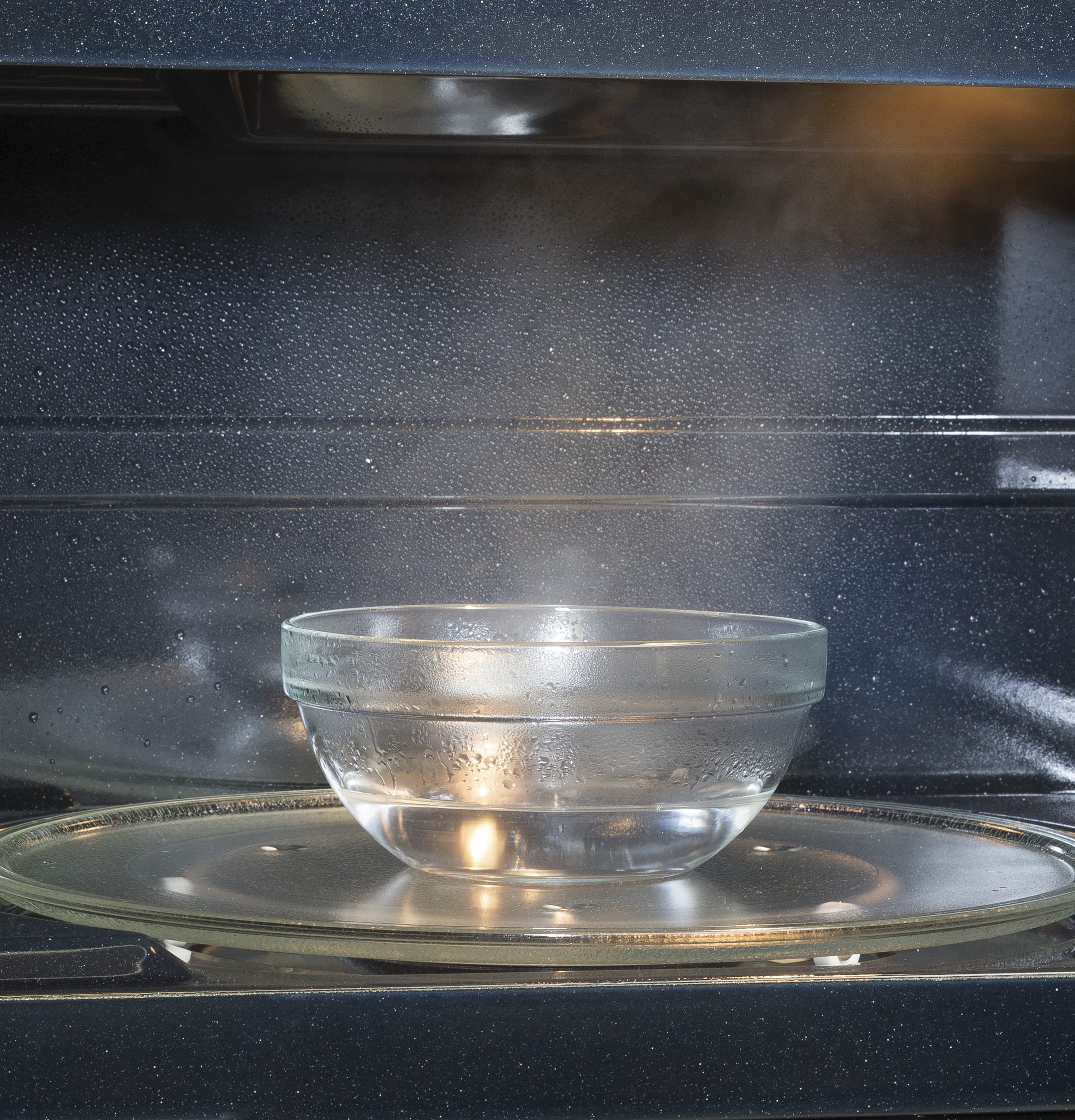 GE Over-the-Range 400 CFM Microwave 1.9 Cu. Ft Steam JVM7195DKBB - Image 9